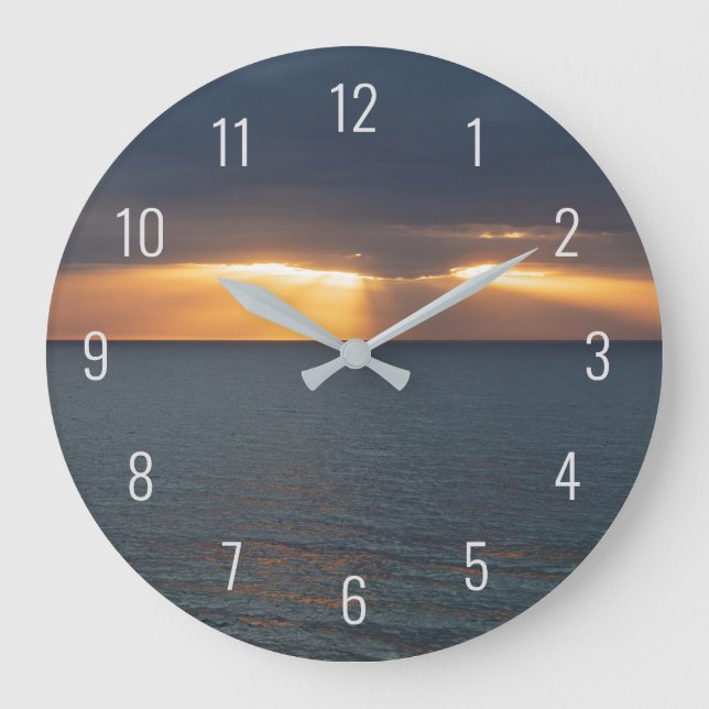 Sunset over the ocean breaking through the clouds large clock (Front)