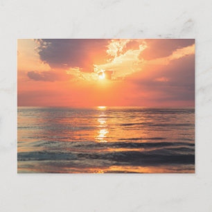 sunset over water postcard