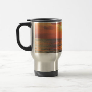 sunset over water travel mug