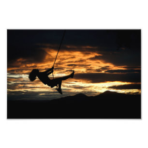Sunset Silhouette of Girl on Swing Photo Print