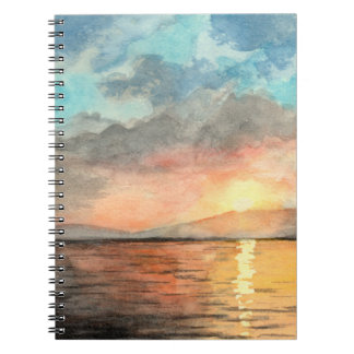Sunset watercolor painting on notebook
