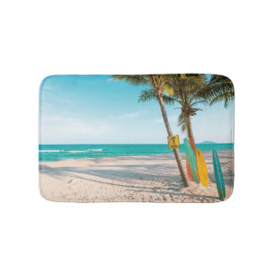 Surf boards on beach throw pillow bath mat