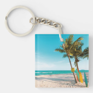 Surf boards on beach throw pillow key ring
