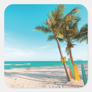 Surf boards on beach throw pillow square sticker