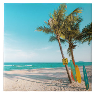 Surf boards on beach throw pillow tile