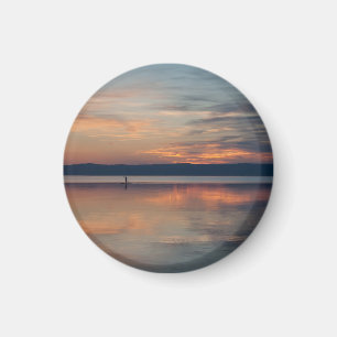 Surfer rowing to shore magnet