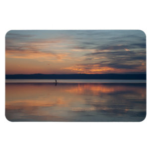 Surfer rowing to shore magnet