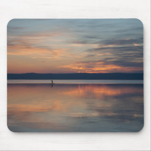 Surfer rowing to shore mouse pad