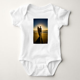 Surfer silhouette during sunrise baby bodysuit