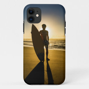 Surfer silhouette during sunrise iPhone 11 case