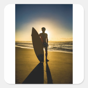 Surfer silhouette during sunrise square sticker