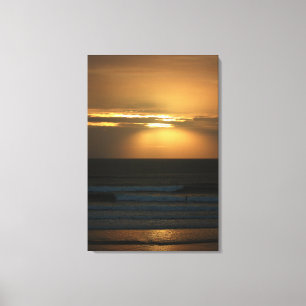 Surfing at Sunset Canvas Print