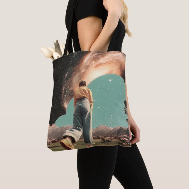 Surreal figure walking into galaxy gateway tote bag (Close Up)