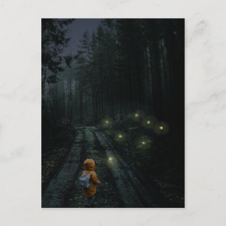 Surreal nighttime scene of boy in a forest postcard