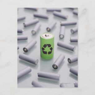 Surrounded by smaller grey batteries. postcard
