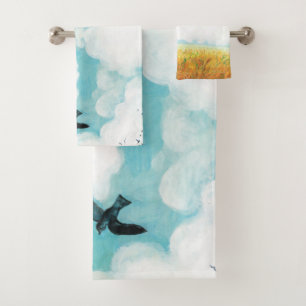 Swallows flying over cloudy blue sky   beach towel
