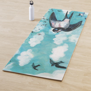 Swallows flying over cloudy blue sky yoga mat