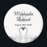 Swan couple names monogram wedding magnet<br><div class="desc">Two beautiful swans in love on a lake bending their heads toghether and forming a heart. White elegant background.  Template for your names and date. Black letters. 
A swan couple stay together for life,  so they are the perfect symbol of love.</div>