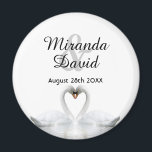 Swan couple names monogram wedding magnet<br><div class="desc">Two beautiful swans in love on a lake bending their heads toghether and forming a heart. White elegant background.  Template for your names and date. Black letters. 
A swan couple stay together for life,  so they are the perfect symbol of love.</div>