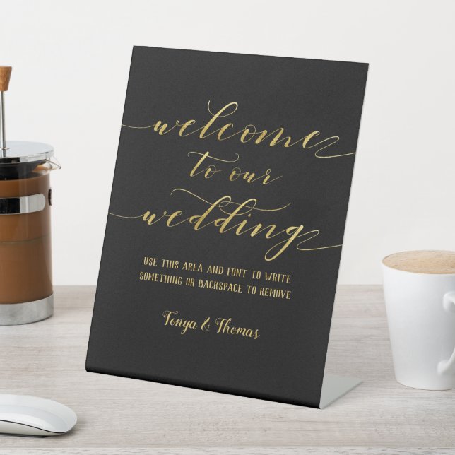 Swash Font Calligraphy Black Gold Welcome Wedding Pedestal Sign (In SItu)