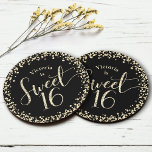 Sweet 16 Black Gold Glitter Confetti Chic Birthday Round Paper Coaster<br><div class="desc">“Happy Sweet 16”. Celebrate her birthday with this fun, stunning, simple, personalised paper coaster. Gold glitter script typography and confetti overlay a black background. Personalise the custom text with your daughter’s name. Choose from multiple shapes. Sold as a set of 6. Great for the budding fashionista who loves modern glitter...</div>