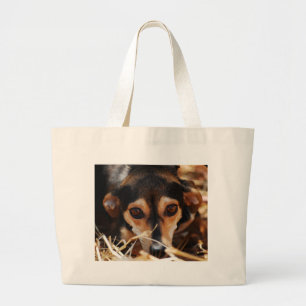Sweet dog laying in hay large tote bag