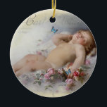Sweet Dreams Ceramic Tree Decoration<br><div class="desc">A most beautiful and enchanting painting in the public domain of a cherub asleep on a white cloud. I have added butterflies,  and re-touched the painting and then laid it upon a vintage French post card.  © Wickedly Lovely/Julie McIver</div>