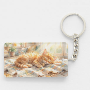 Sweet little kitten sunbathing key ring