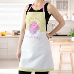 Sweet Pink Cupcake Bakery Dessert Yellow Custom Apron<br><div class="desc">Here’s a wonderful way to add to the fun of baking. Add extra sparkle to your culinary adventures whenever you wear this elegant, sophisticated, simple, and modern apron. A sparkly, pink cupcake and script handwritten typography overlay a polka dot and light pastel lemon yellow background. Personalise with your name or...</div>