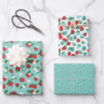 Sweet Red Blue Strawberries White Flowers Pattern Wrapping Paper Sheet<br><div class="desc">Red and blue strawberry themed wrapping paper sheets with three matching strawberry patterns: one sheet with red strawberries, leaves, and white flowers against a blue background, one sheet with lots of strawberries in red and shades of blue and teal, and one turquoise sheet with little strawberry seeds also in blue...</div>