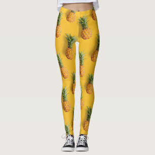 Sweet tasty pineapple on deep yellow background leggings