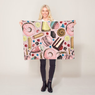 Sweet treats on pink fleece blanket