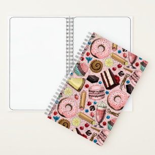Sweet treats on pink notebook