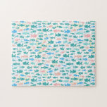 Swimming Fish Cute Nautical Pattern Challenging Jigsaw Puzzle<br><div class="desc">Are you good enough at puzzles to solve this difficult one with fish on it? This jigsaw puzzle has a repeating pattern of fish swimming in shades of blue, green, and salmon pink on a light coral-reef background. It's perfect for conjuring up some beach vibes. Choose your own puzzle size....</div>