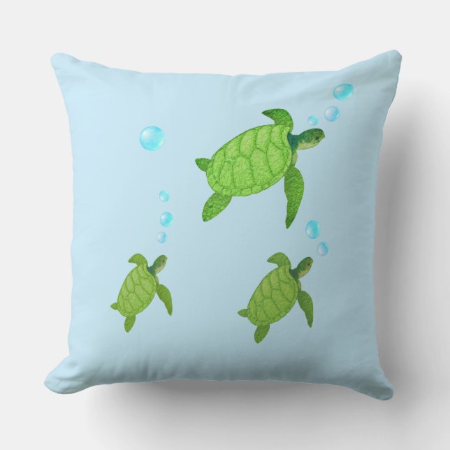 Swimming green sea turtles on turquoise cushion (Front)