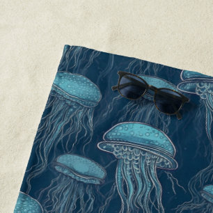 Swimming jellyfish in a deep blue ocean beach towel