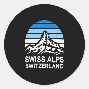 Swiss alps retro mountain scene with striped sky classic round sticker