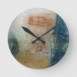Symbolic figures (cave painting) round clock
