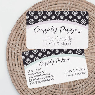 Symmetric White Flower Pattern on Black Arch Business Card