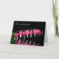 Sympathy-bleeding hearts reflected in water