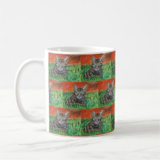Tabby cat in nature coffee mug