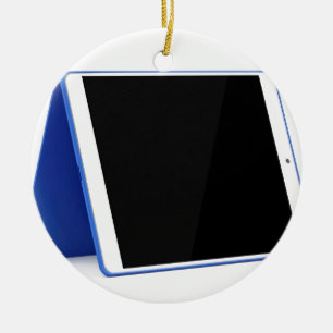 Tablet computer on white ceramic tree decoration