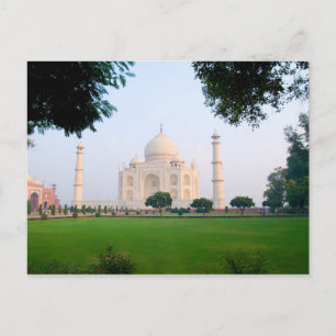 Taj Mahal at sunrise one of the wonders of the Postcard
