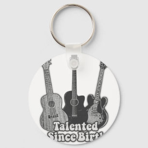 Talented since birth. vintage black & white guitar key ring