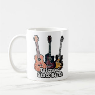 Talented since birth. vintage colourful guitar coffee mug