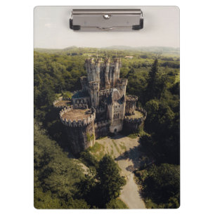 Tall Grey Stone Castle in Green Overgrown Woods Clipboard