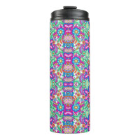 Tall travel mug with a vibrant, symmetrical floral