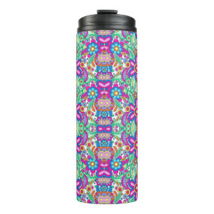Tall travel mug with a vibrant, symmetrical floral