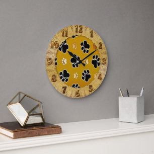 Tan and black paw print on a gold background #2 large clock