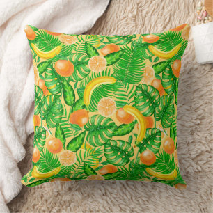 Tangerines, bananas and tropical leaves cushion